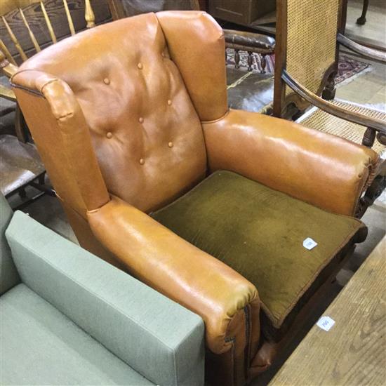 Buttoned leather  wingback arnchair